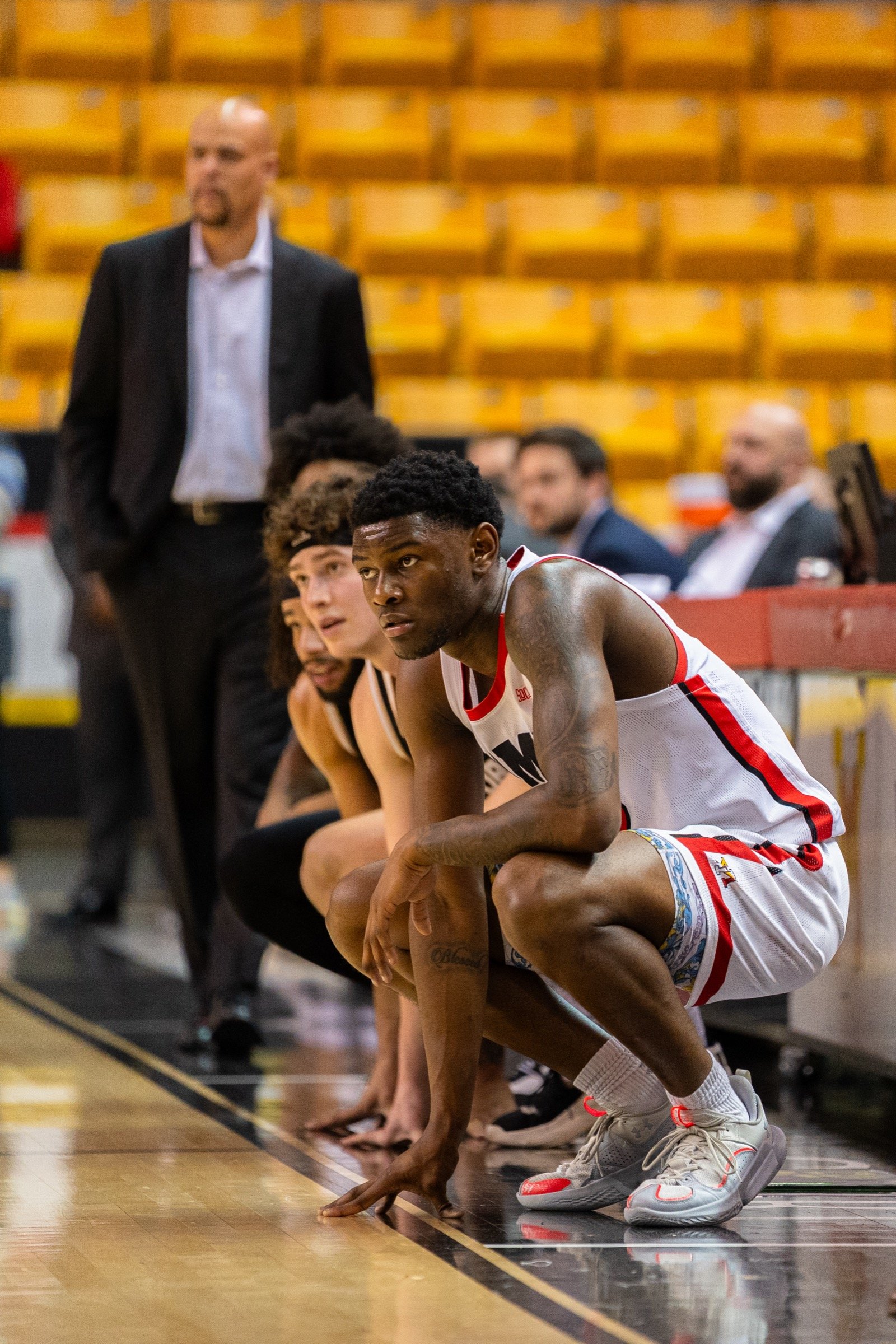 Basketball player in late-game competitive situation