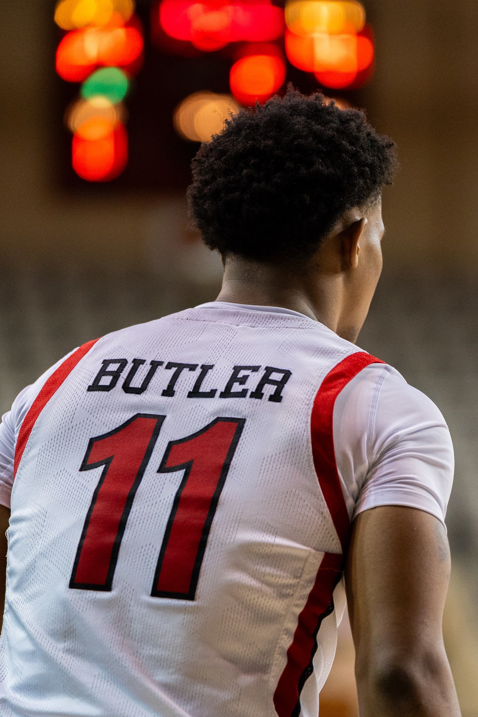 Basketball player in athletic stance or motion